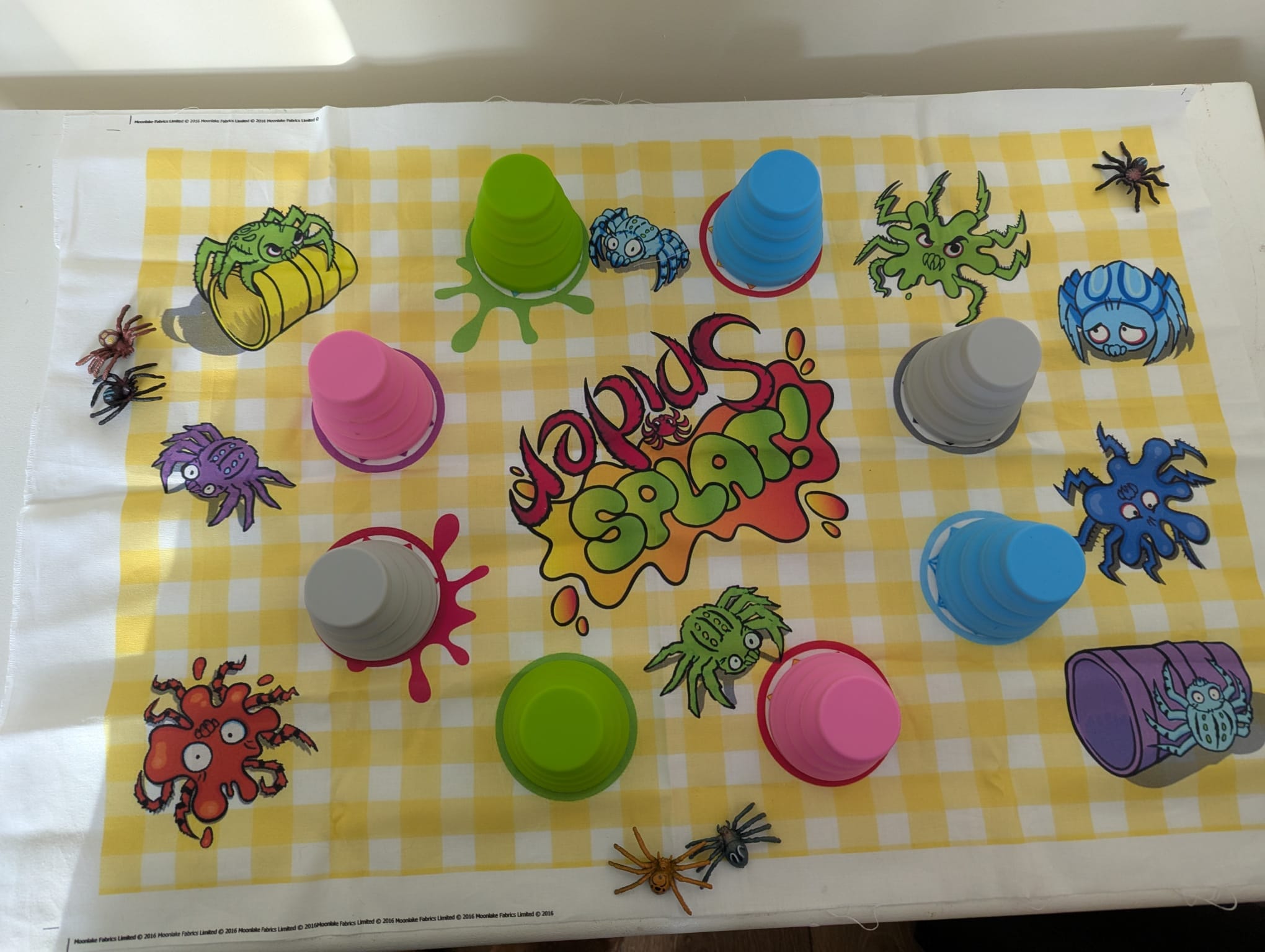 Spider Splat game board and components in use