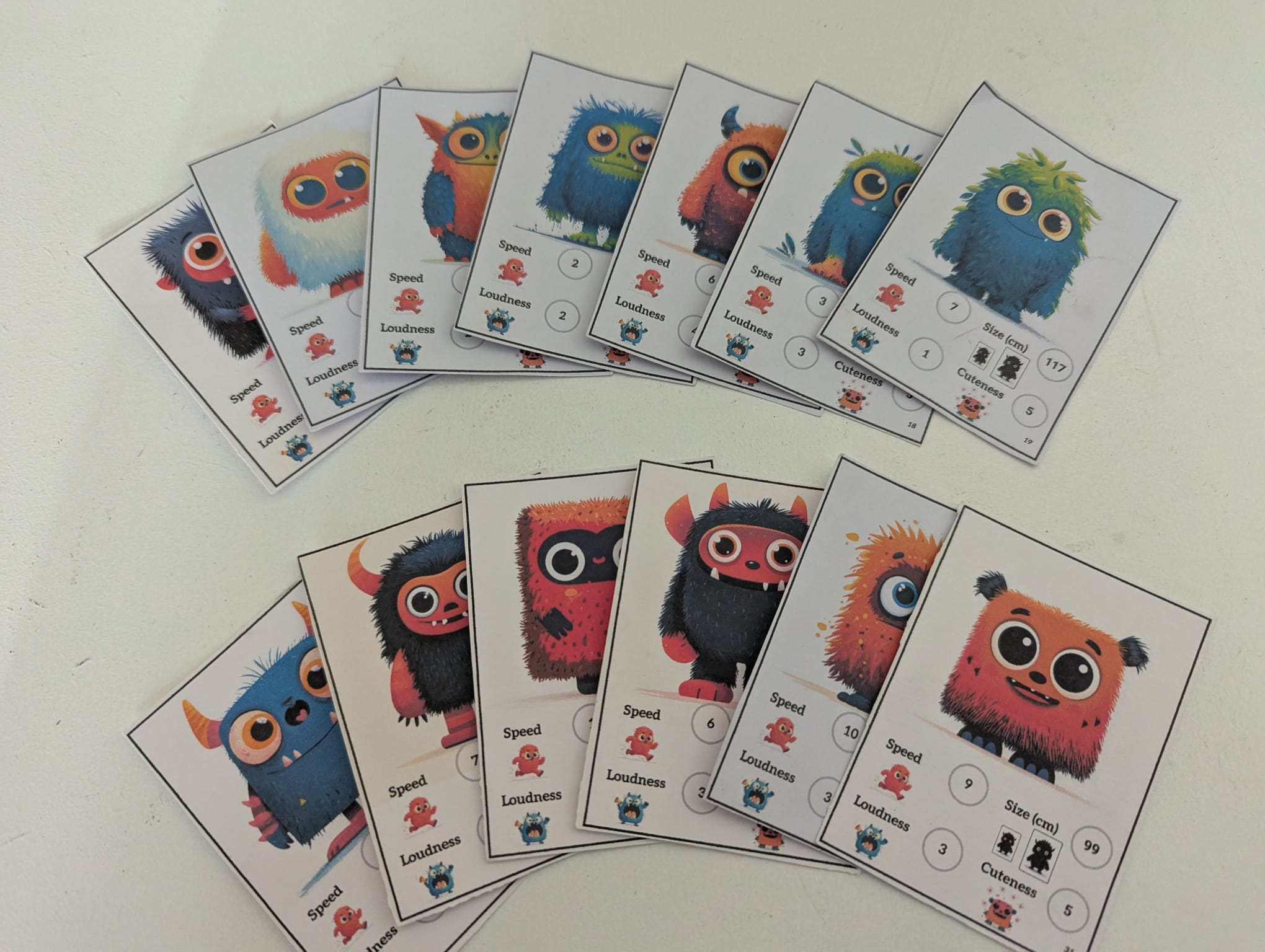 A player holding a fan of Monster Matches game cards