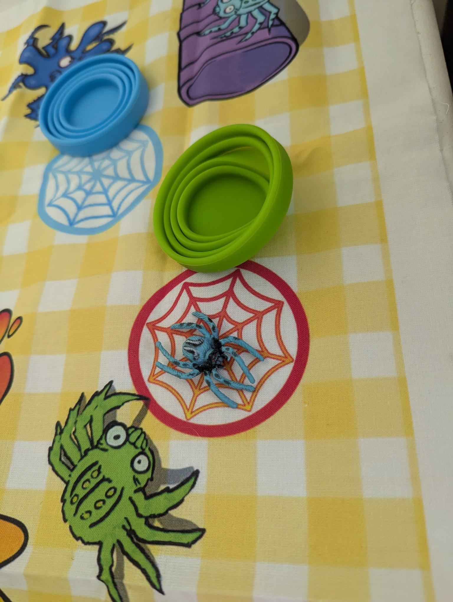 A splatted spider card with the Spider Splat cup